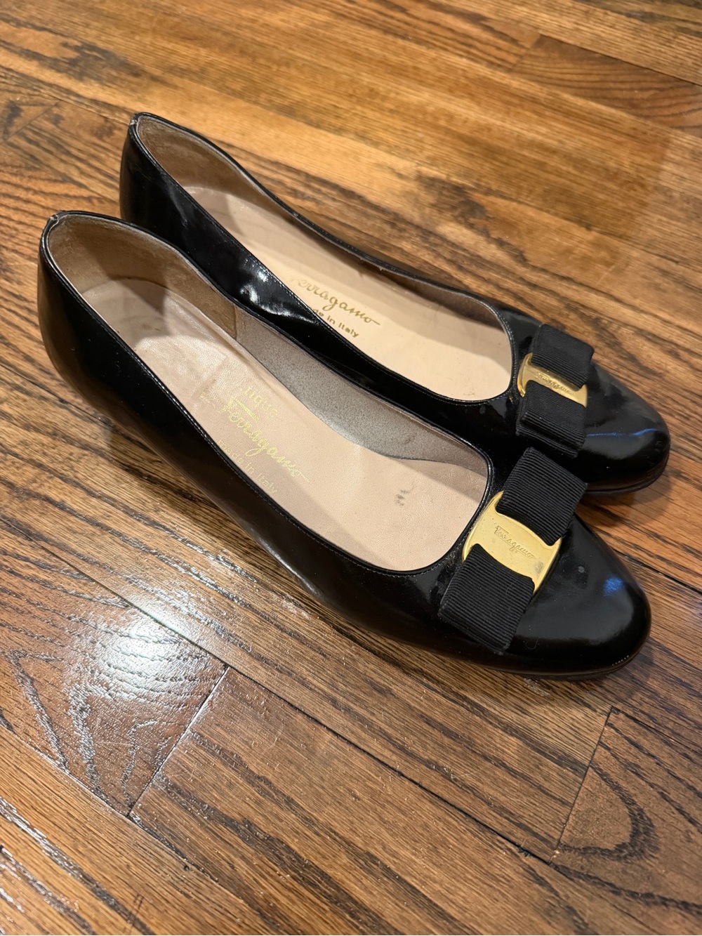 Salvatore Ferragamo Black Patent Vara Bow Flats with Gold Accent